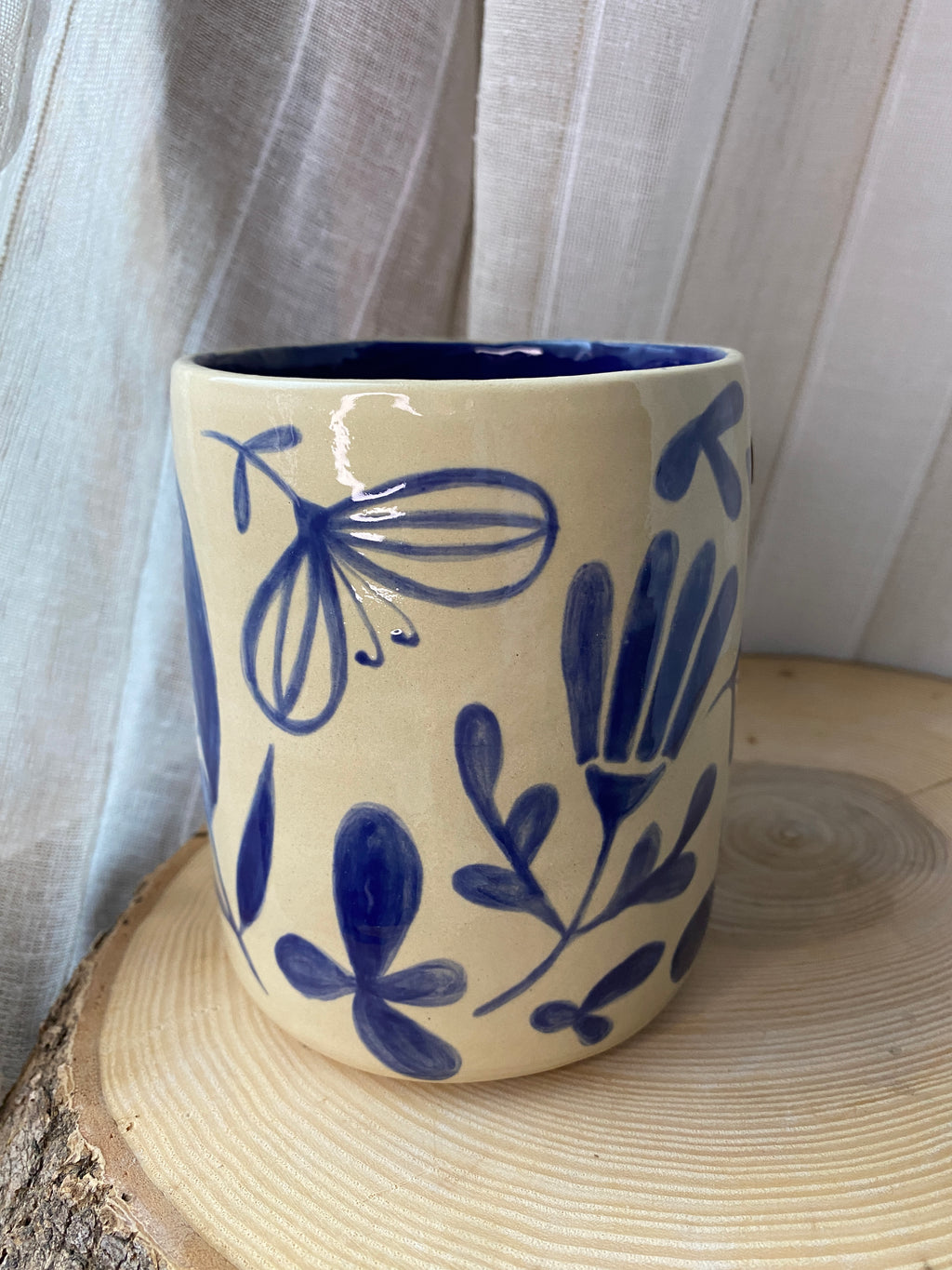 A) Květináč / Stojan na vařečky