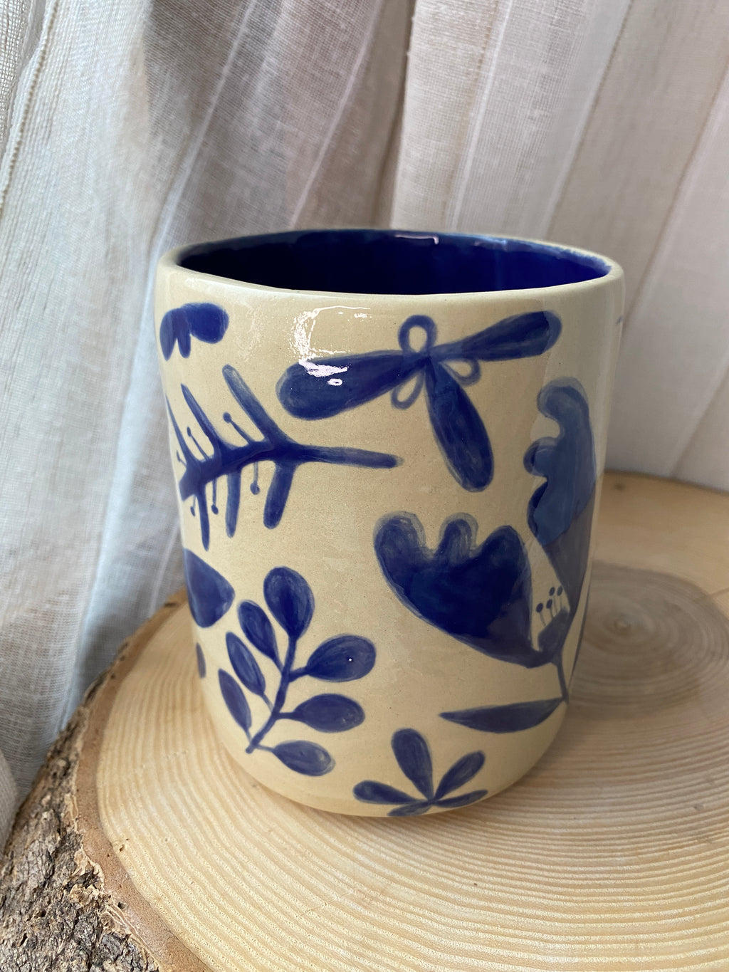 A) Květináč / Stojan na vařečky