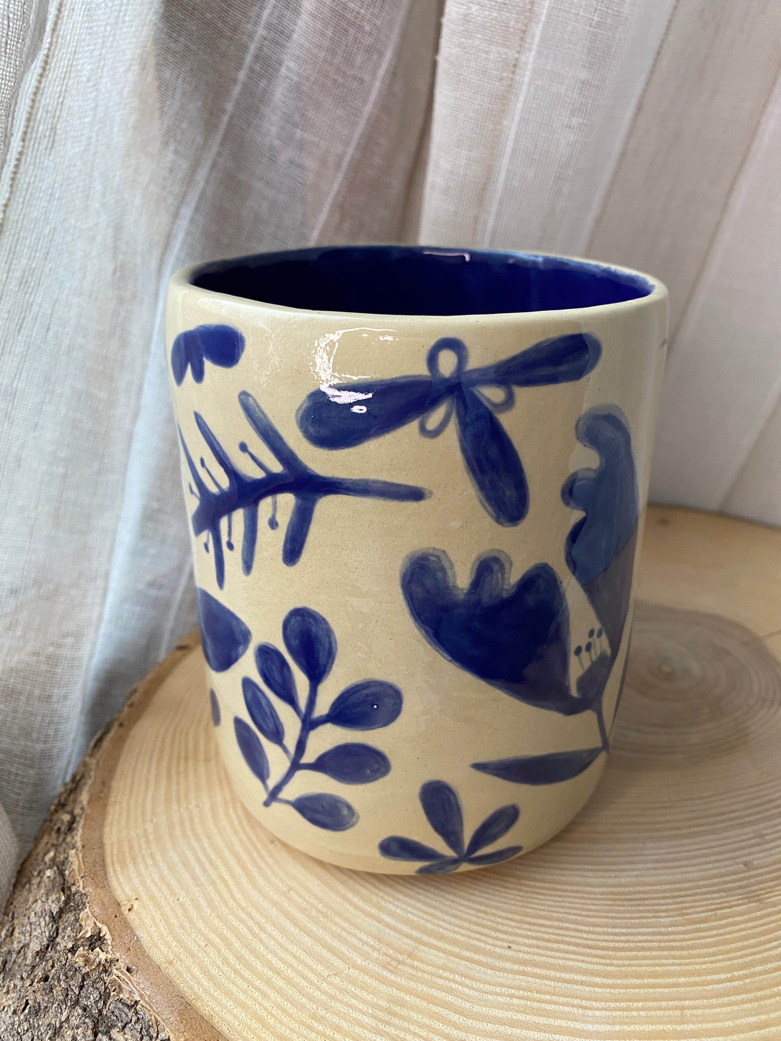 A) Květináč / Stojan na vařečky